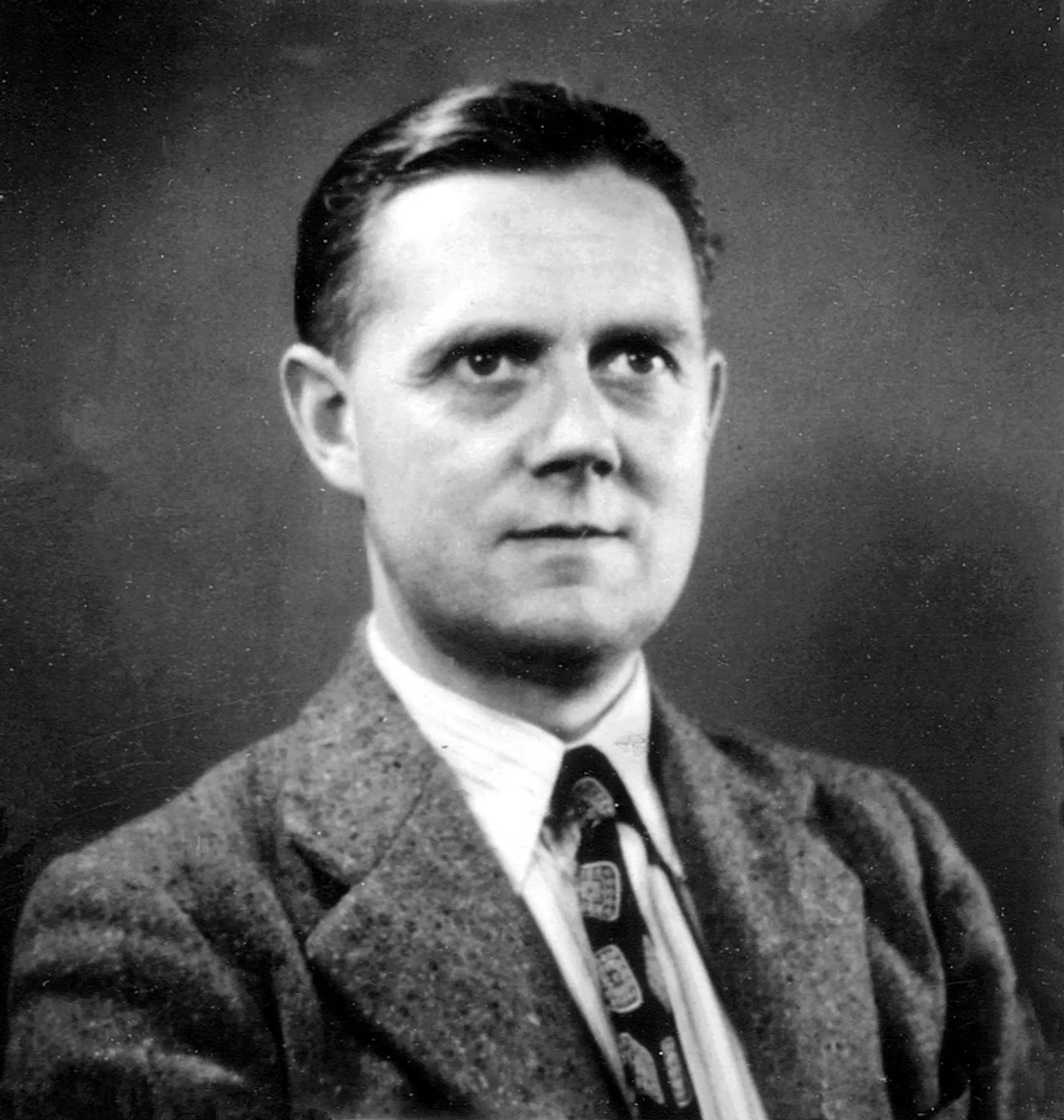 W. Ross Ashby, photographed in 1948 - the British cybernetician who described "amplifying intelligence" seventy years before vibe coding